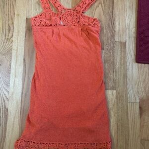 Trina Turk size 0 sleeveless orange dress with a crochet top and hem.